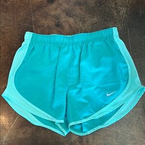 Women’s Nike running shorts teal seafoam. Size Medium.